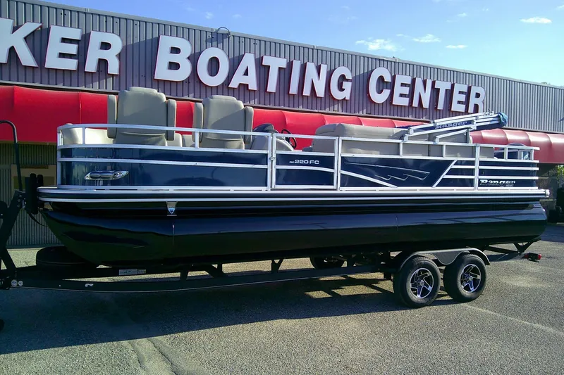 Slide: The Image of 2024 Ranger Reata 220FC pontoon boat on trailer at dealership. - 83
