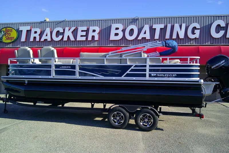 Slide: The Image of 2024 Ranger Reata 220FC pontoon boat displayed at Tracker Boating Center. - 84