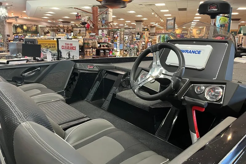 Slide: The Image of 2024 Ranger Z518 Ranger Cup Equipped boat interior with steering wheel and dashboard display. - 4