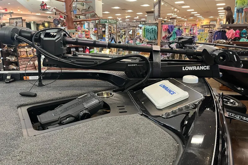 Slide: The Image of 2024 Ranger Z518 boat with Lowrance equipment in a store display. - 5