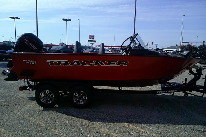 Slide: The Image of 2026 Tracker Targa V-18 Combo boat on trailer in parking lot. - 3