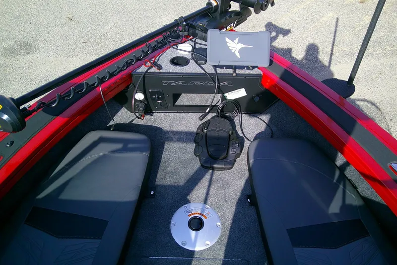 Slide: The Image of 2026 Tracker Targa V-18 Combo boat interior with advanced control panel and seating. - 7