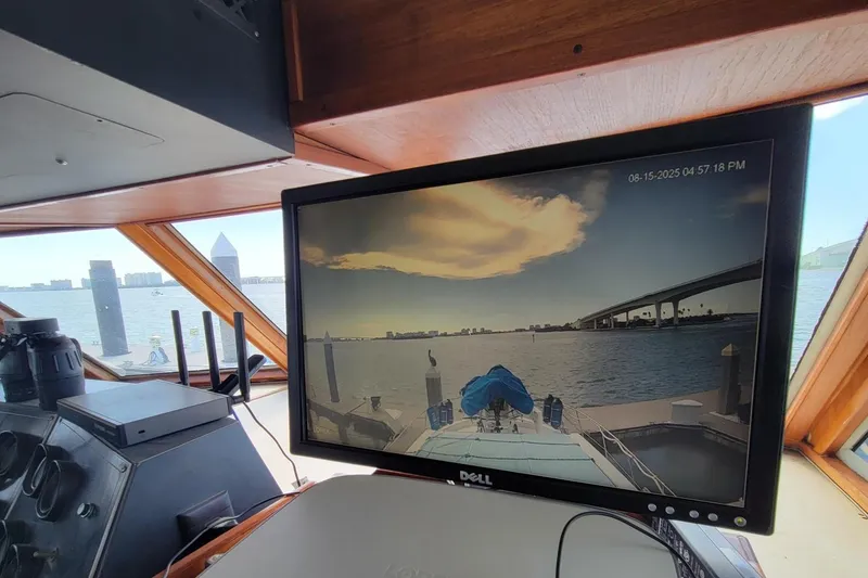 Slide: The Image of Interior of 1985 Chris-Craft 500 Constellation with monitor displaying marina view. - 14