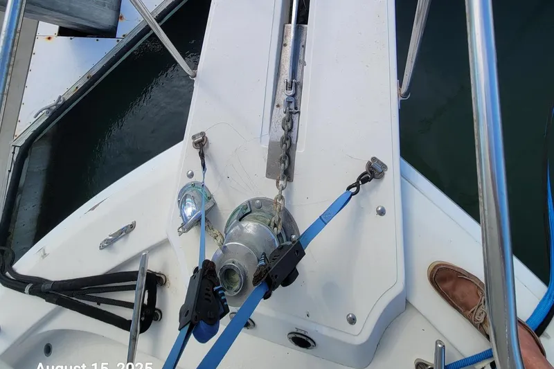 Slide: The Image of 1985 Chris-Craft 500 Constellation boat deck with anchor chain and winch system. - 58