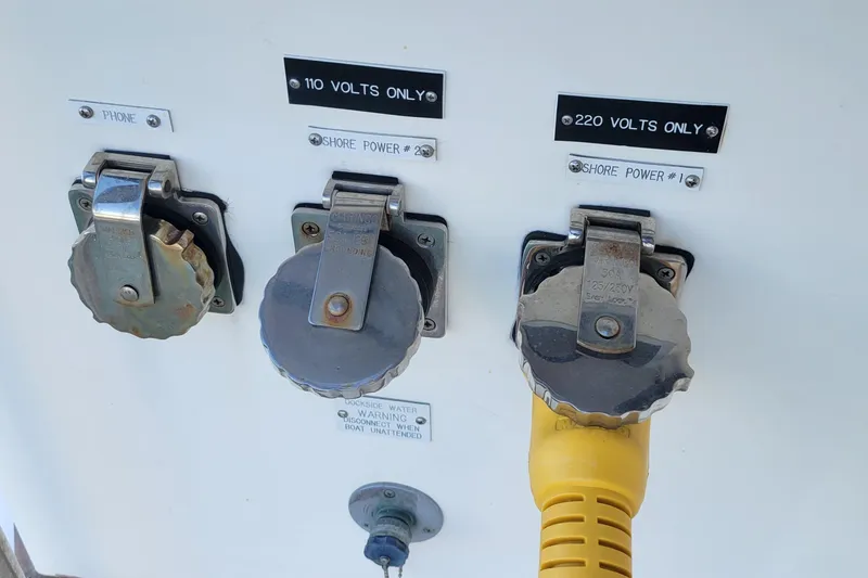 Slide: The Image of Electrical panel on a 1985 Chris-Craft 500 Constellation with shore power connections. - 60