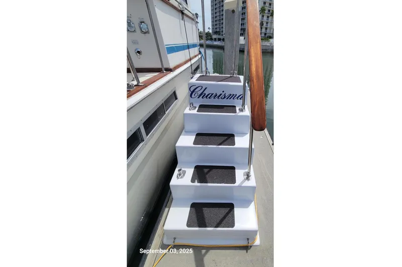 Slide: The Image of Stairs leading to a 1985 Chris-Craft 500 Constellation yacht named "Charisma." - 61