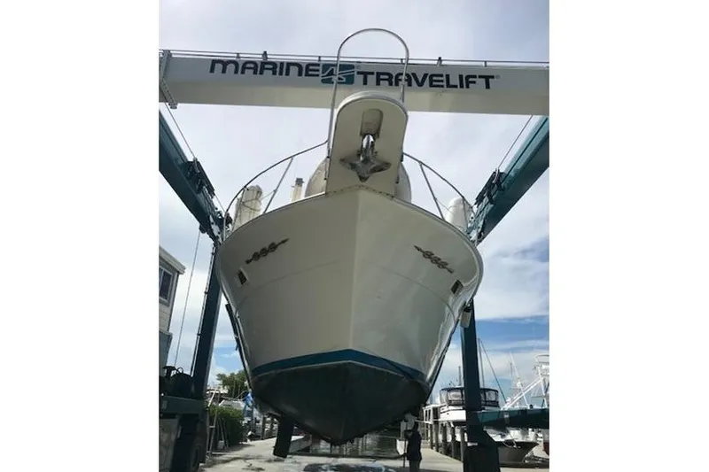 Slide: The Image of 1985 Chris-Craft 500 Constellation yacht on Marine Travelift, front view. - 63
