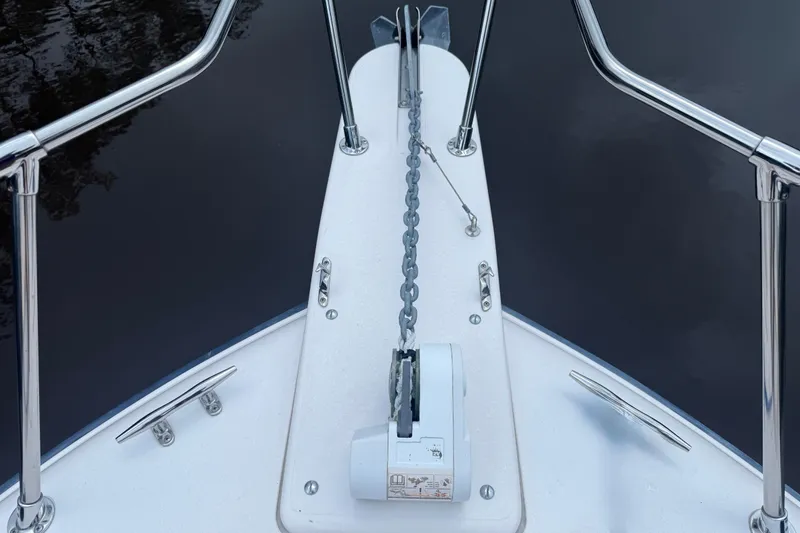 Slide: The Image of Bow of 2003 Grady-White Sailfish 282 with anchor chain and railing. - 11