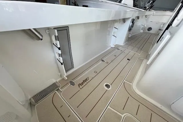 Slide: The Image of 2025 Parker 2600 Center Console boat interior with sleek deck design and modern features. - 19