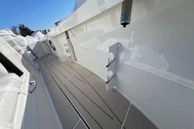 Slide: The Image of 2025 Parker 2600 Center Console boat deck with sleek design and modern features. - 31