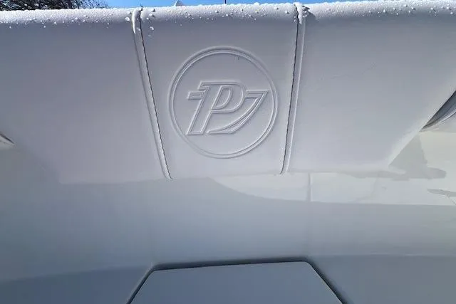Slide: The Image of 2025 Parker 2600 Center Console boat seat with embossed logo detail. - 33