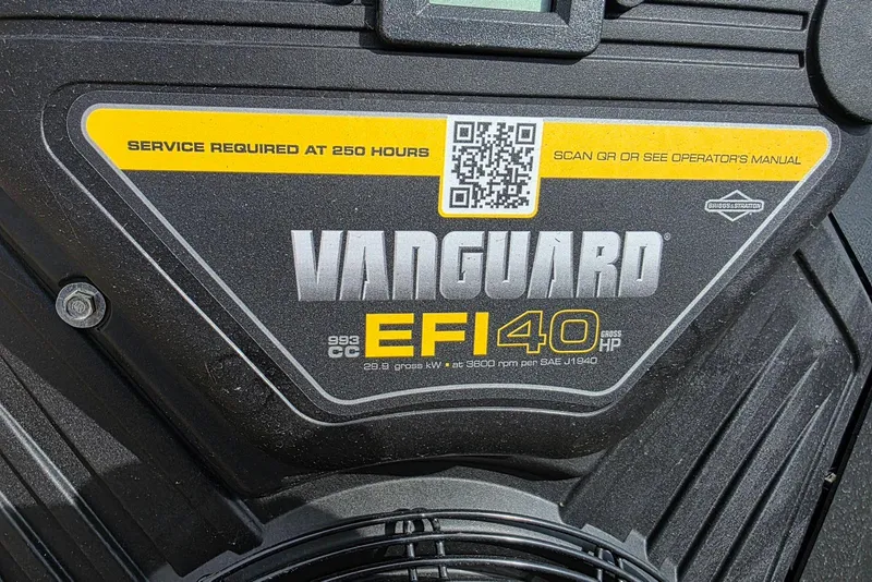 Slide: The Image of Vanguard EFI 40 engine label on Xpress Bayou 180, 2026 model, with service instructions. - 19