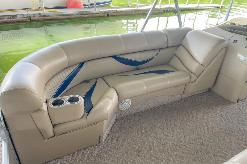 Slide: The Image of Luxurious seating on a 2011 Berkshire 263 SLX boat with cup holders and elegant design. - 10