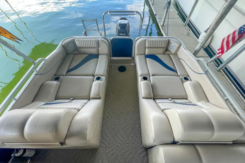 Slide: The Image of 2011 Berkshire 263 SLX pontoon boat with luxurious seating and water view. - 15