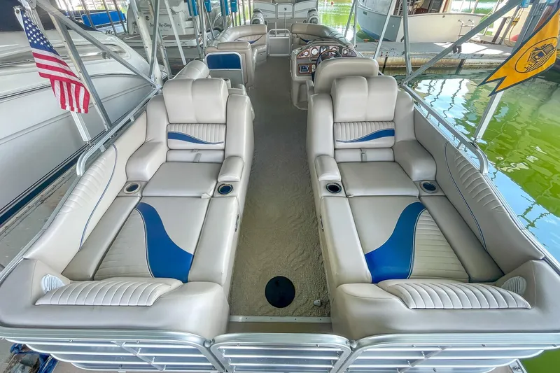 Slide: The Image of 2011 Berkshire 263 SLX pontoon boat with spacious seating and elegant interior design. - 17