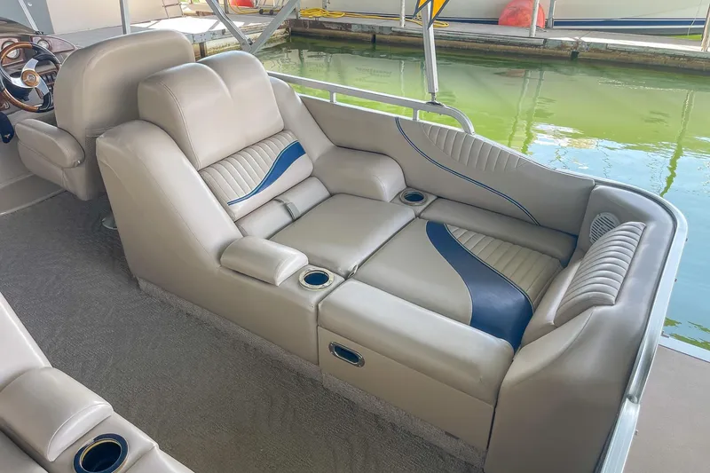 Slide: The Image of Luxurious seating on a 2011 Berkshire 263 SLX boat with elegant design and cup holders. - 19