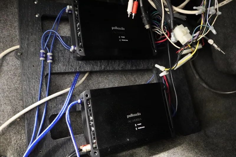 Slide: The Image of Audio system wiring in 2011 Nautique 210 SUPER AIR boat, featuring Polk Audio components. - 34
