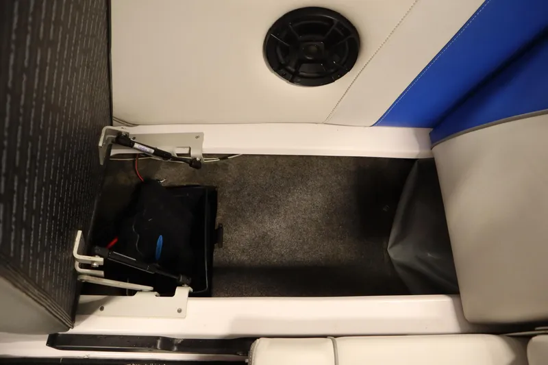 Slide: The Image of 2011 Nautique 210 SUPER AIR interior with speaker and storage compartment. - 40