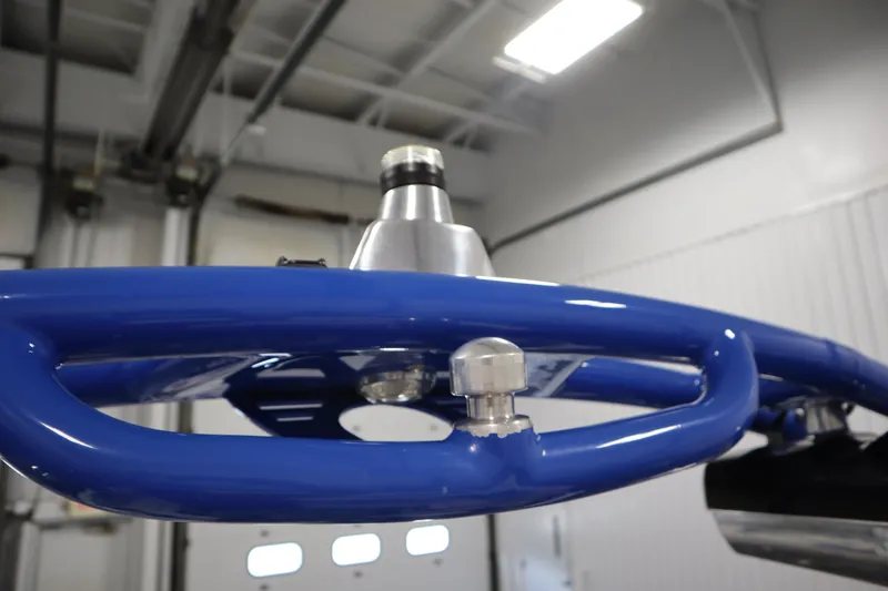 Slide: The Image of Close-up of blue metal component on 2011 Nautique 210 SUPER AIR boat. - 46