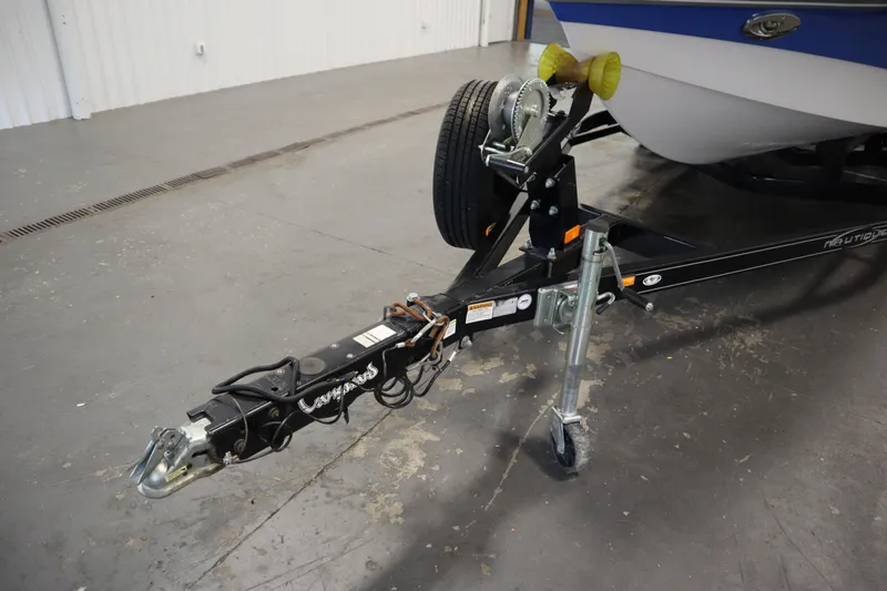 Slide: The Image of Trailer hitch of 2011 Nautique 210 SUPER AIR boat in a garage setting. - 53