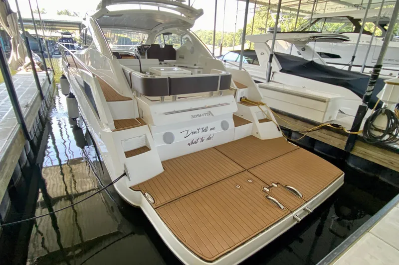 Slide: The Image of Radar equipment on 2018 Galeon 385 HTS yacht in marina setting. - 16