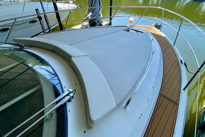 Slide: The Image of Luxurious interior of 2018 Galeon 385 HTS yacht with elegant seating and cushions. - 21