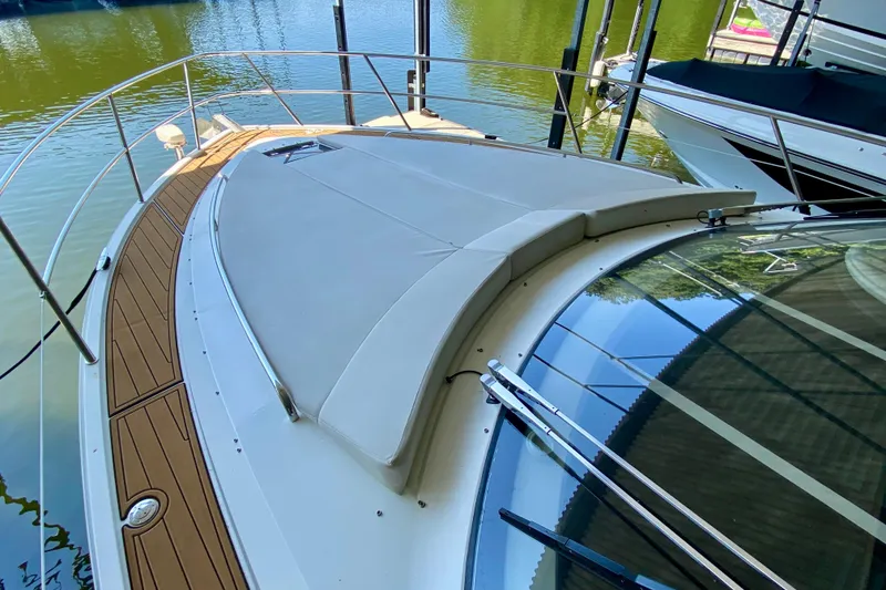Slide: The Image of Galeon 385 HTS 2018 yacht interior with sleek cabinetry and mini fridge. - 23