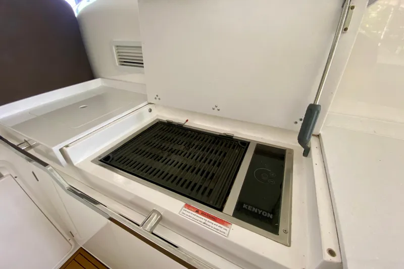 Slide: The Image of Interior of 2018 Galeon 385 HTS yacht with modern seating and sleek design. - 32