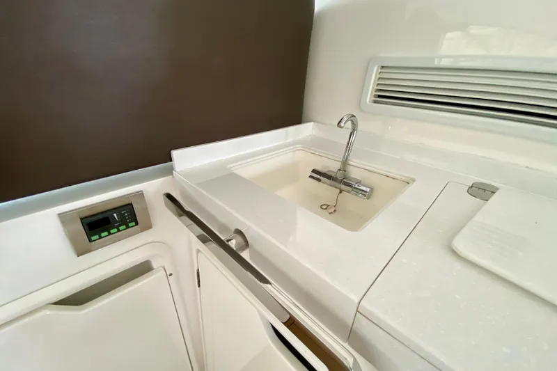 Slide: The Image of Interior of 2018 Galeon 385 HTS yacht with plush seating and panoramic windows. - 33