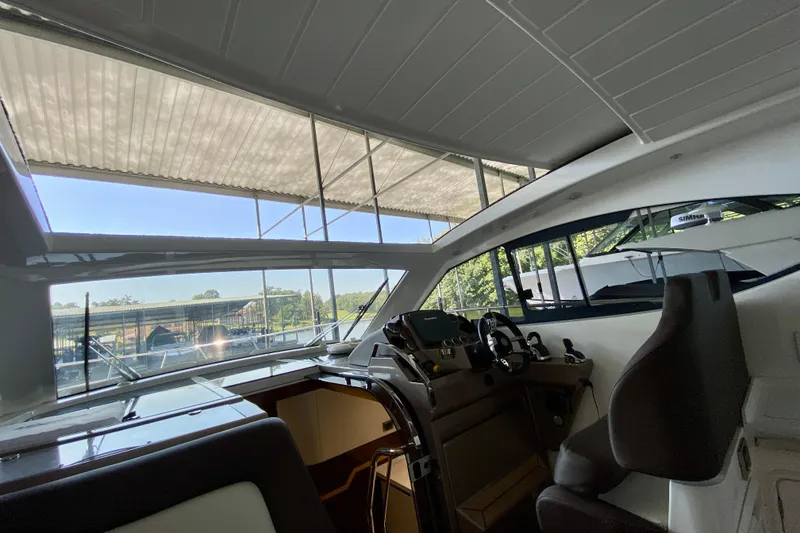 Slide: The Image of Luxurious interior of 2018 Galeon 385 HTS yacht with wood paneling and modern amenities. - 42