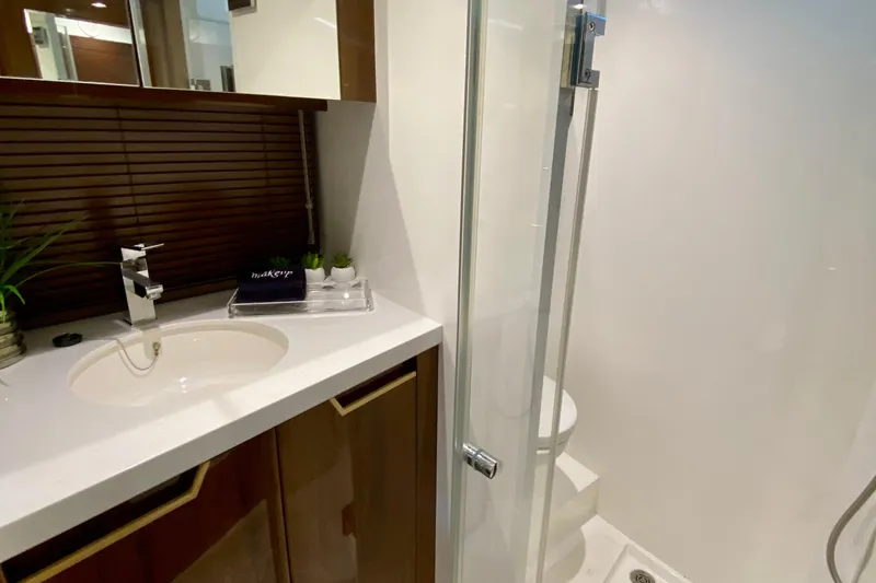 Slide: The Image of Interior of 2018 Galeon 385 HTS yacht, featuring sleek seating and modern helm. - 52