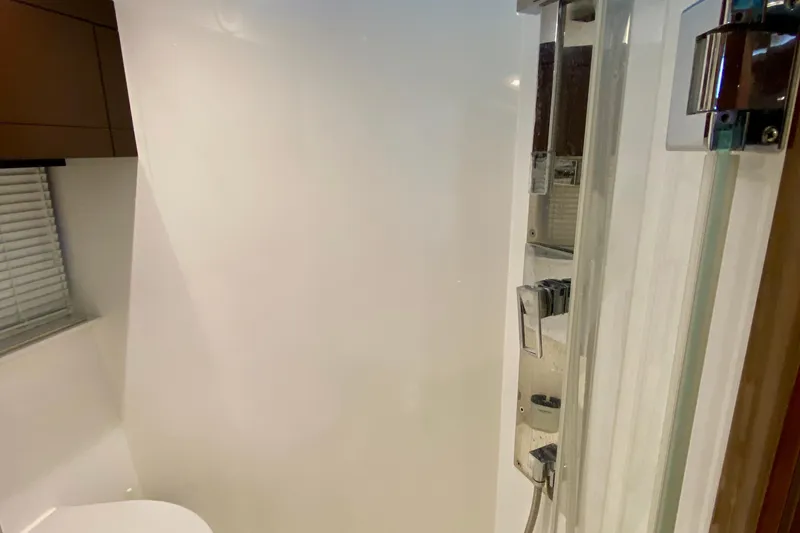 Slide: The Image of Luxurious interior of 2018 Galeon 385 HTS yacht with modern kitchen and seating area. - 53