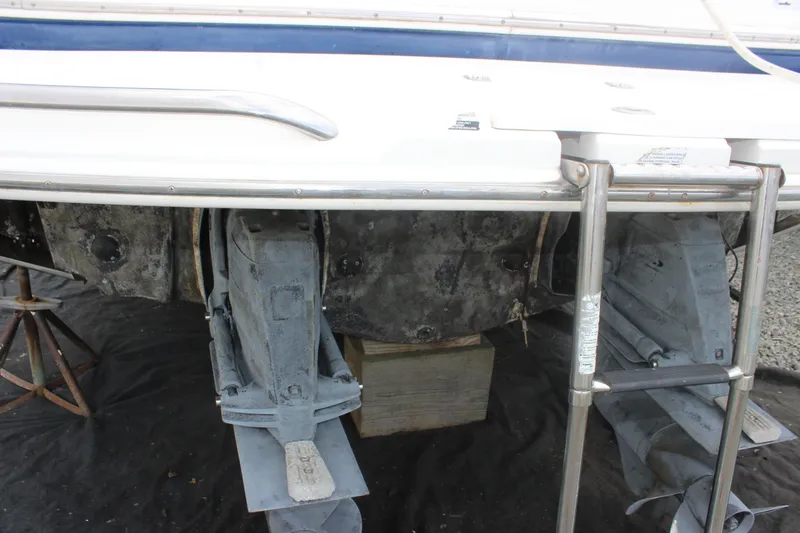 Slide: The Image of 2008 Chaparral Signature 350 boat stern with ladder and outdrive visible. - 14