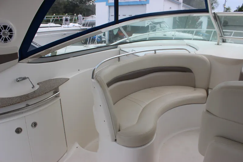 Slide: The Image of 2008 Chaparral Signature 350 boat interior with curved seating and sleek design. - 15