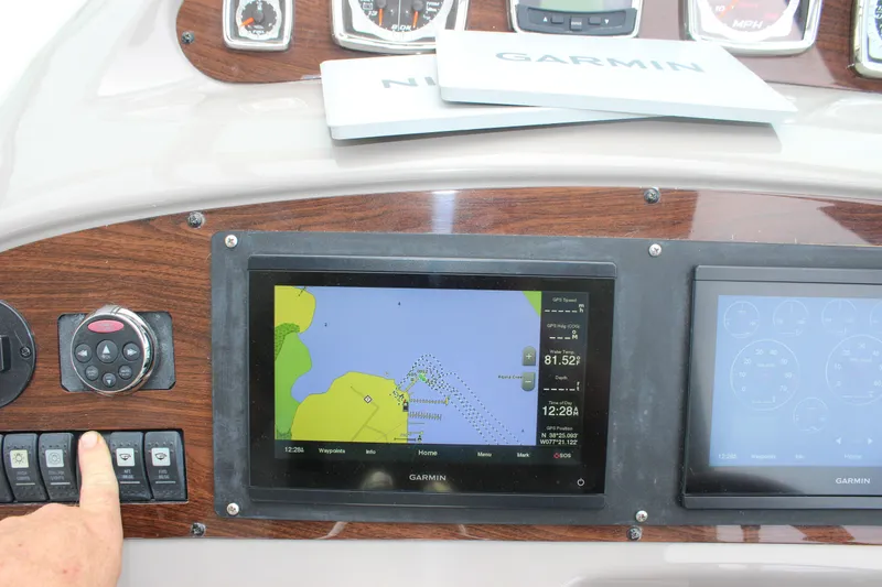 Slide: The Image of Dashboard of a 2008 Chaparral Signature 350 with Garmin navigation system. - 25