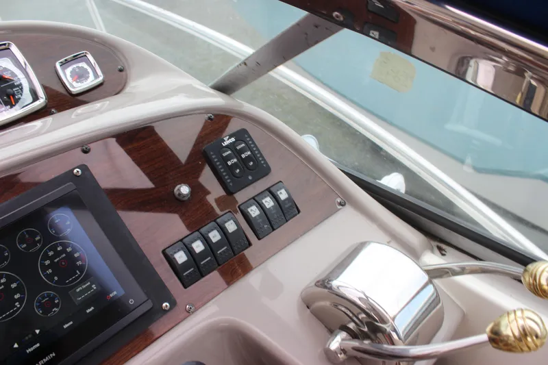 Slide: The Image of Control panel of 2008 Chaparral Signature 350 boat with gauges and switches. - 26