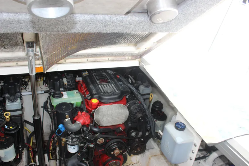 Slide: The Image of Engine compartment of 2008 Chaparral Signature 350 boat, showcasing mechanical components. - 28