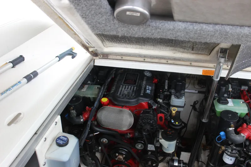 Slide: The Image of Engine compartment of a 2008 Chaparral Signature 350 boat, showcasing mechanical components. - 29