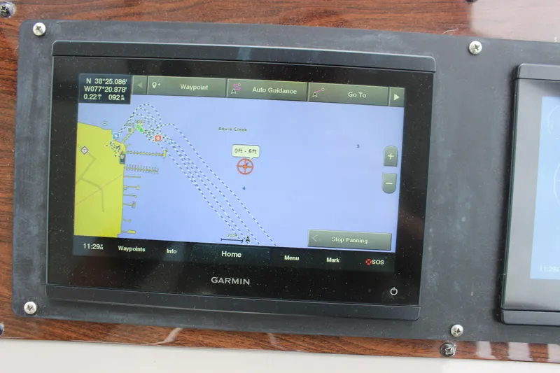 Slide: The Image of Garmin navigation display on 2008 Chaparral Signature 350 boat dashboard. - 36