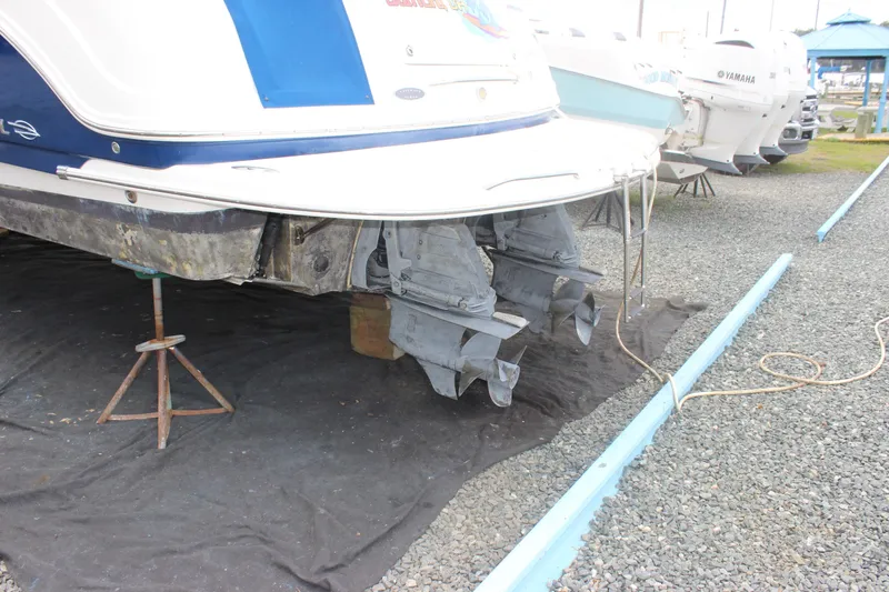 Slide: The Image of 2008 Chaparral Signature 350 boat on stands, showing dual outboard motors. - 9