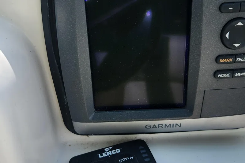 Slide: The Image of Garmin navigation system on 2012 Key West 211 DC boat dashboard. - 18