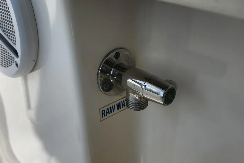 Slide: The Image of Key West 211 DC 2012 boat raw water outlet and speaker detail. - 20