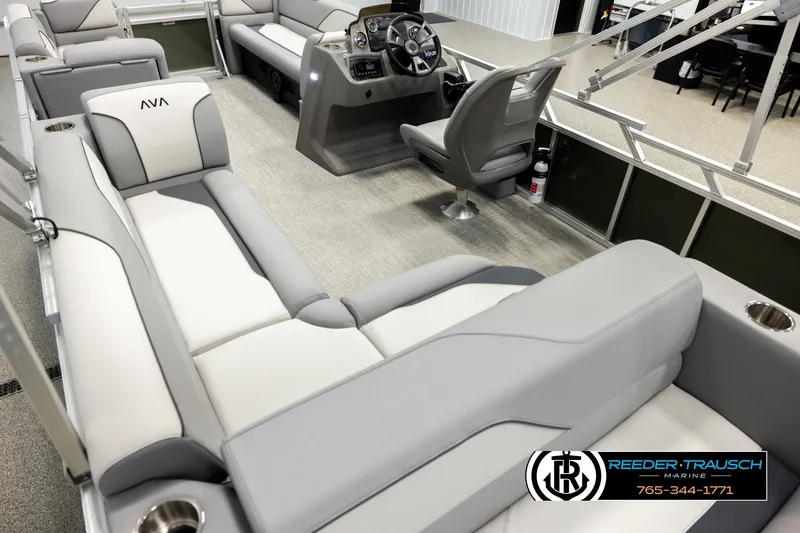 Slide: The Image of Luxurious interior of 2026 Avalon VEN CRB pontoon boat with plush seating and modern helm. - 10