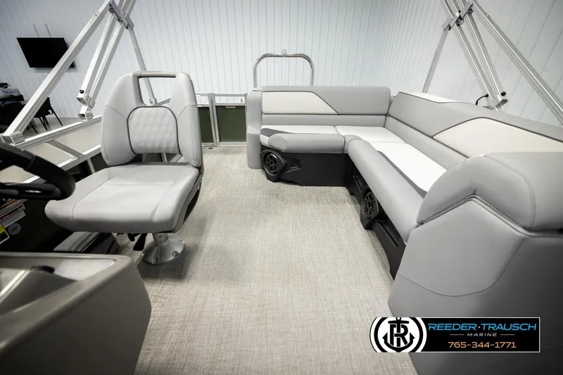 Slide: The Image of Interior of 2026 Avalon VEN CRB boat with modern seating and steering wheel. - 13