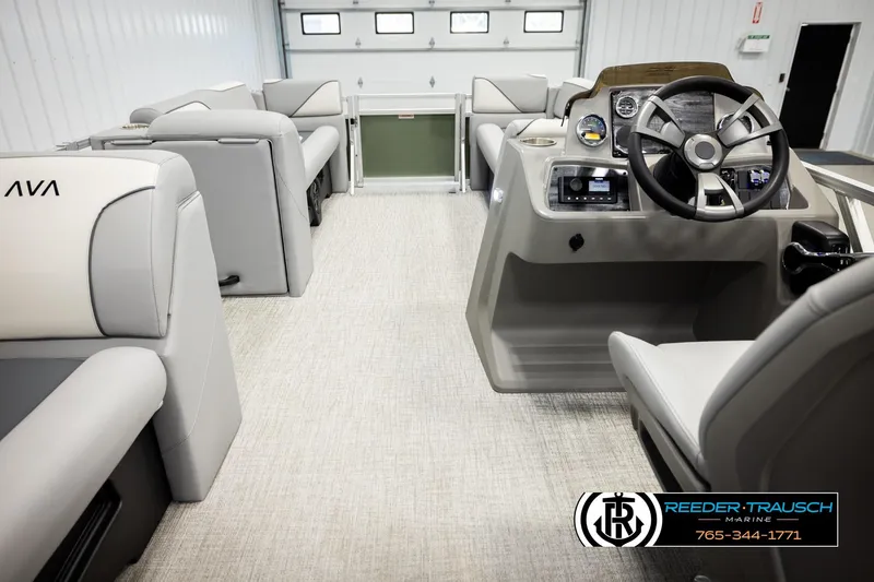 Slide: The Image of 2026 Avalon VEN CRB boat interior with modern steering console and plush seating. - 16