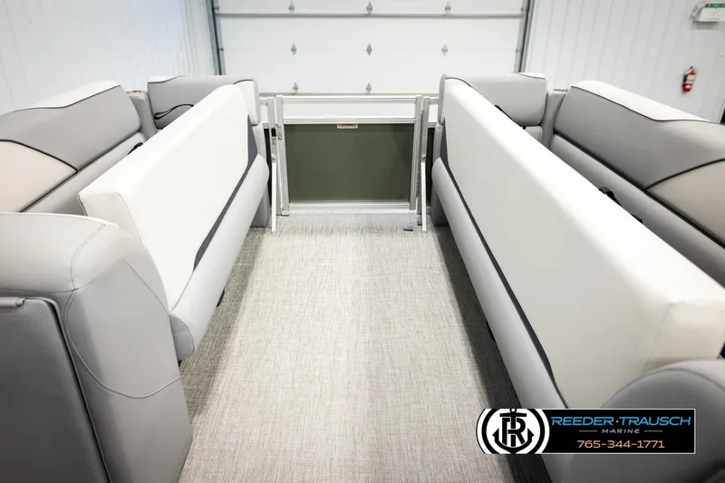 Slide: The Image of Interior of 2026 Avalon VEN CRB boat with gray and white seating. - 18