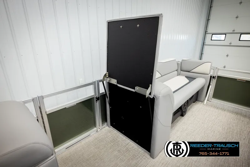 Slide: The Image of 2026 Avalon VEN CRB interior with gray seating and foldable panel in a showroom. - 20