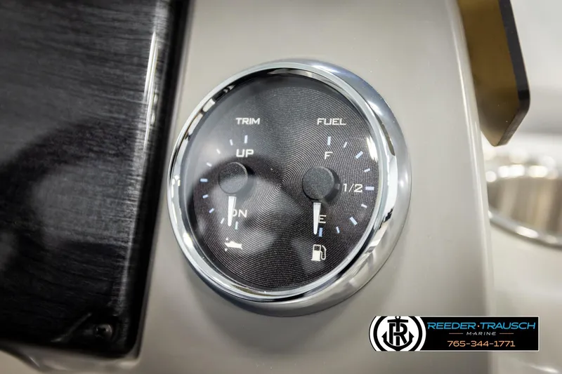 Slide: The Image of Close-up of Avalon VEN CRB 2026 fuel and trim gauge on dashboard. - 31