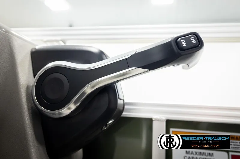 Slide: The Image of Close-up of Avalon VEN CRB 2026 boat throttle lever with up and down controls. - 33