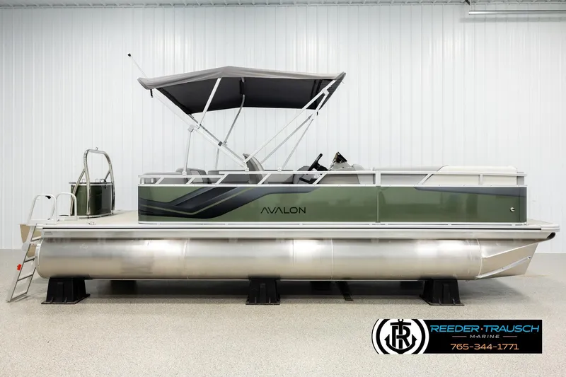 Slide: The Image of 2026 Avalon VEN CRB pontoon boat with canopy in showroom. - 4